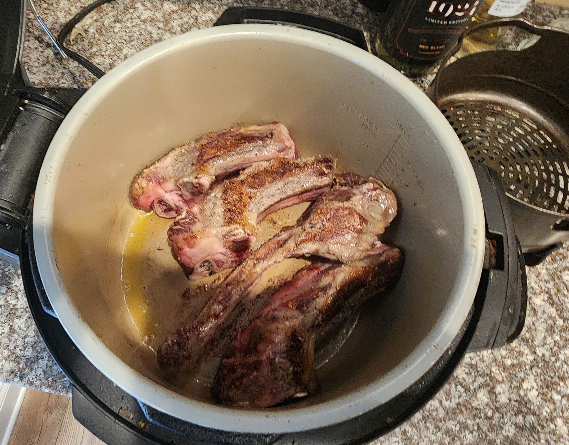 Searing the beef short ribs