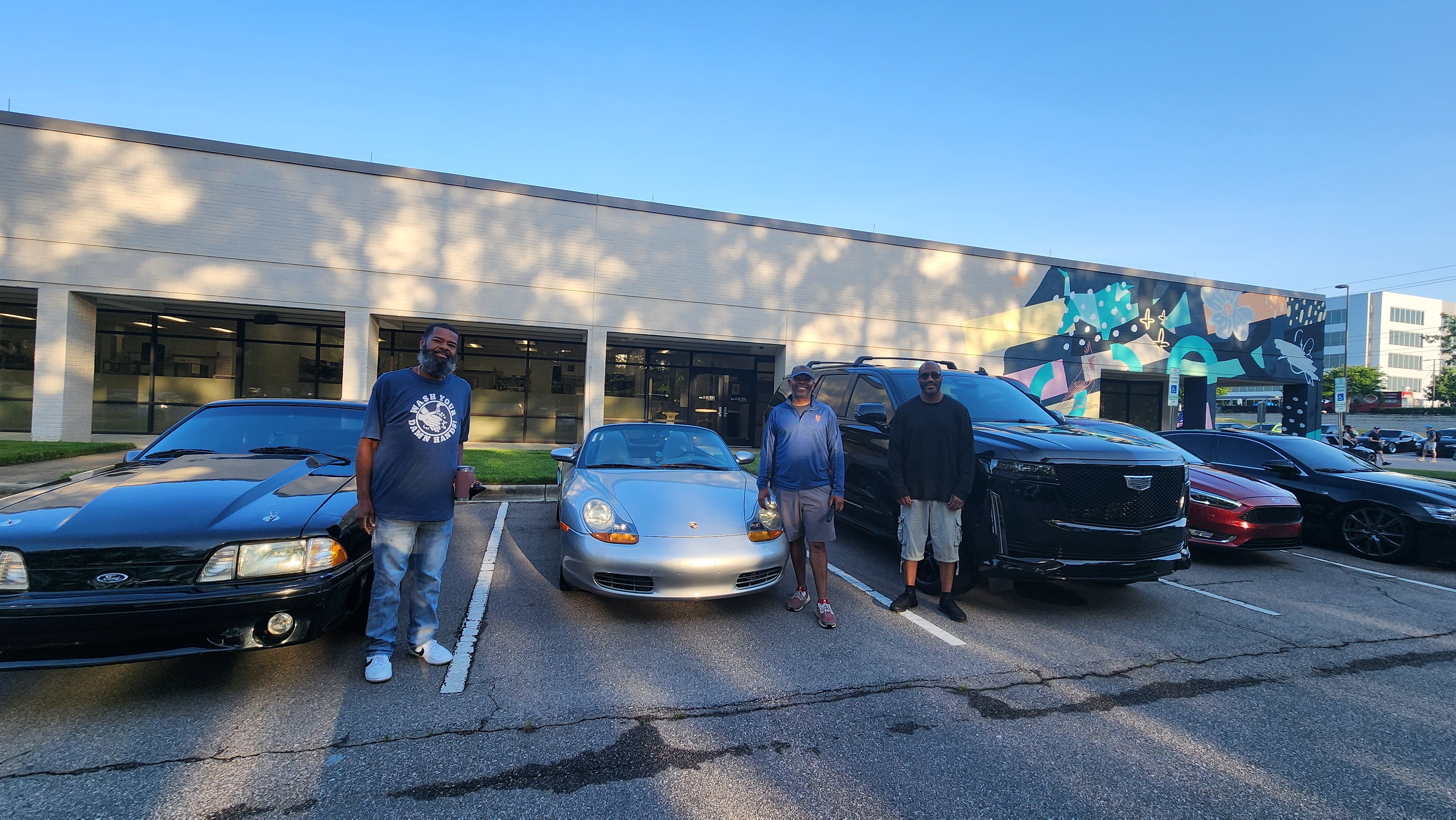 Me and my close friends in front of our cars