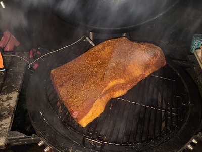 10:45 PM night cook start with smoke rolling over the grates and meat probe